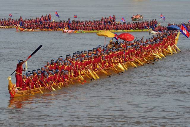 More than three in a boat - A boat, Ceremony, Ritual, People, Cambodia