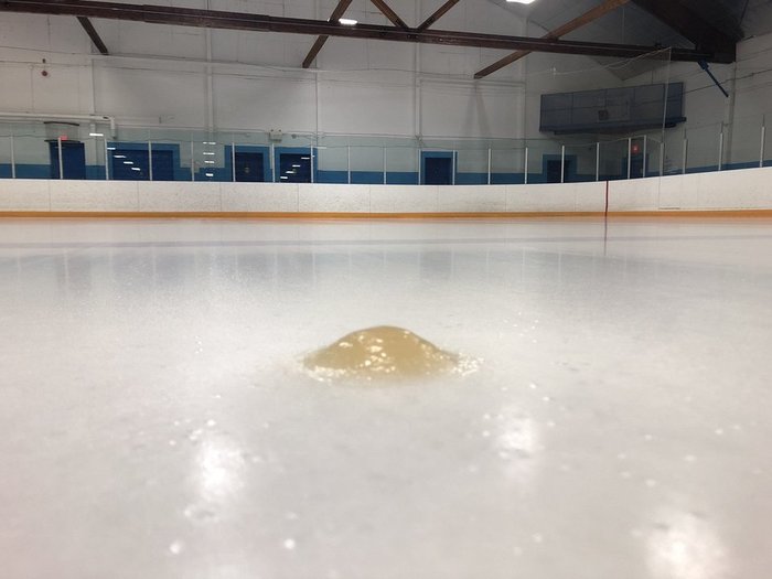 The ceiling in the ice arena leaked, leaving behind a small ice pimple - Ice, Ice Arena, Acne, Ceiling