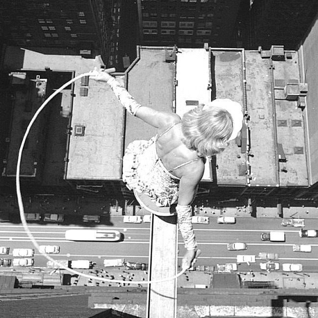 Jump rope on a small platform above the streets of downtown Chicago, Illinois - at least 20 floors, July 13, 1955. - Story, USA, Risk