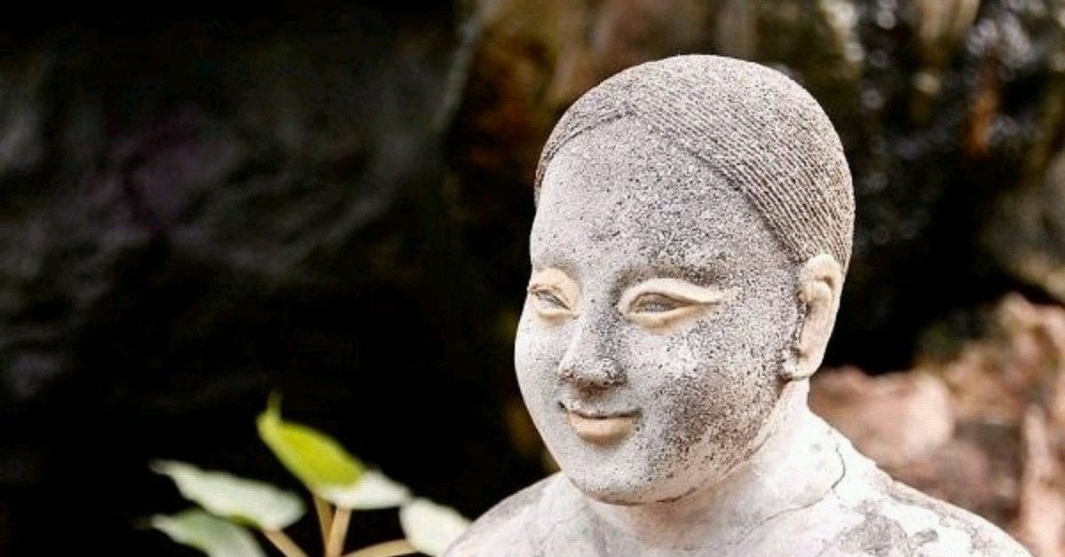 Прическа буды. Буддийские статуи. Каменное лицо Будды. Духовное лицо.