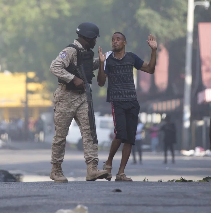 What am I? - Disorder, Haiti, Army, Police, Protest, Detention