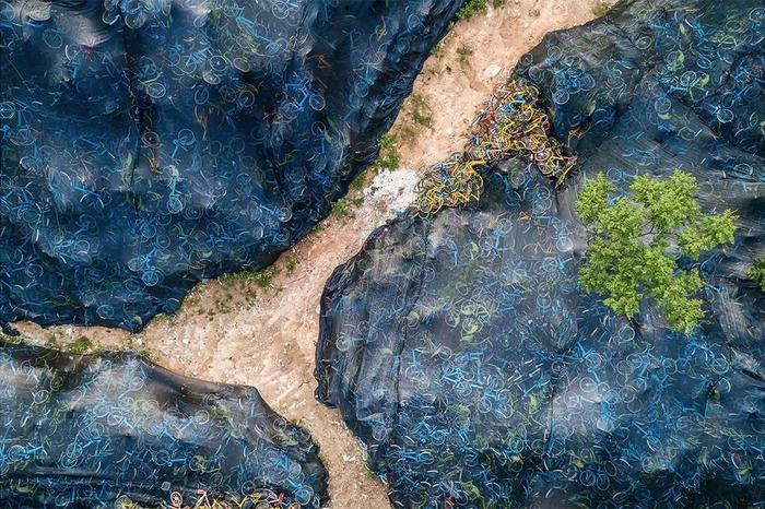 Гигантские велосипедные кладбища показали с дрона Китай, Велосипед, Свалка, Длиннопост, Природа Гигантские велосипедные кладбища показали с дрона Китай, Велосипед, Свалка, Длиннопост, Природа