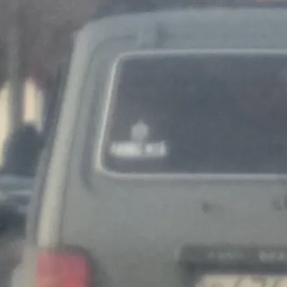 I saw a sticker at a traffic light ahead. From the legible Voice of the FSB. The rest is very small. Does anyone know what it means? - My, Auto, Traffic lights, Sticker, Photo on sneaker