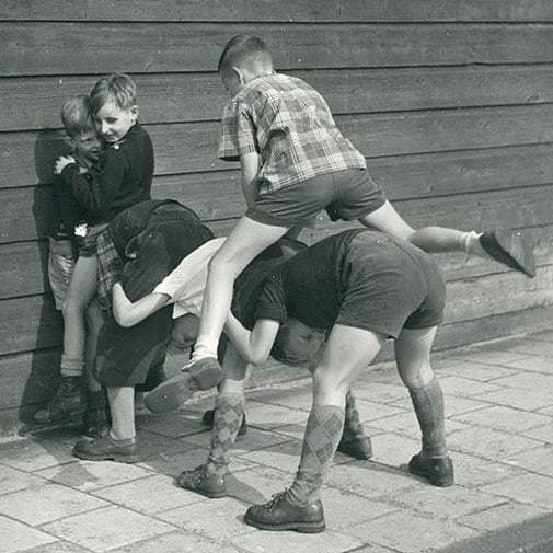 There were no computers or mobile phones back then. - Children, Boy, The street, Outdoor games, Kids games, Netherlands (Holland), Black and white photo, 50th