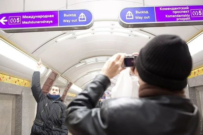 Why do the signs in the St. Petersburg metro say 'WAY OUT' instead of 'EXIT'? - Metro, Saint Petersburg