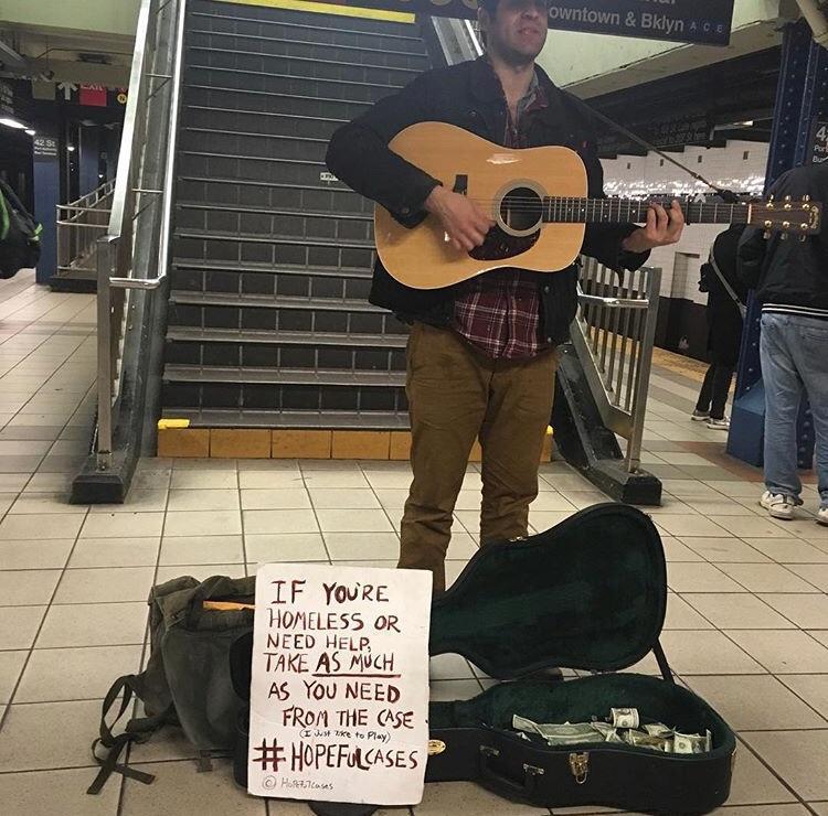 What planet is this on? - Metro, Playing guitar, Guitar, USA, Homeless