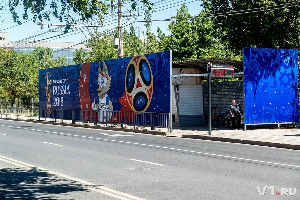 On one of the central streets of Volgograd, on Zhukov Avenue, a public transport stop was closed with a banner - 2018 FIFA World Cup, Banner, Volgograd