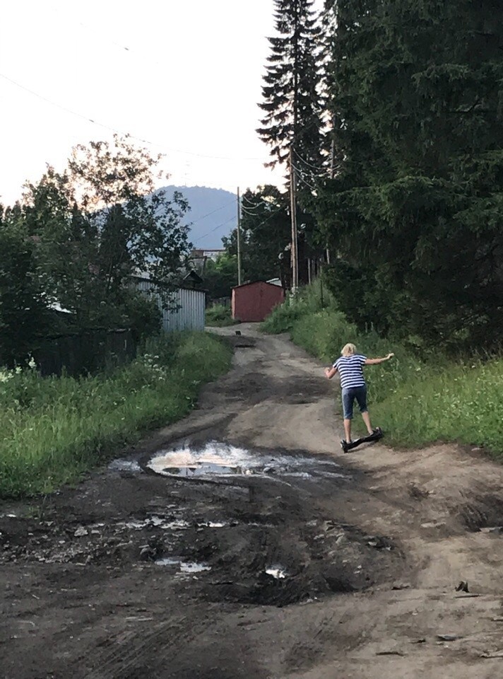 On a hoverboard to the village. - Village, Hoverboard, Humor