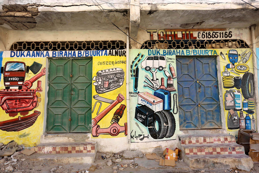 In Somalia, shop fronts are painted in such a way that illiterate residents can easily understand what they are selling there. - My, Somalia, Longpost, Street art, Artist